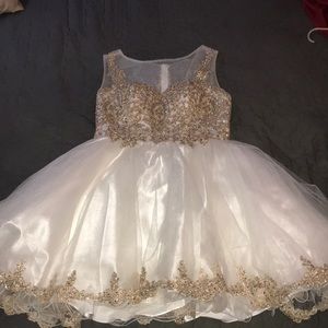 white dress with champagne gold detailing